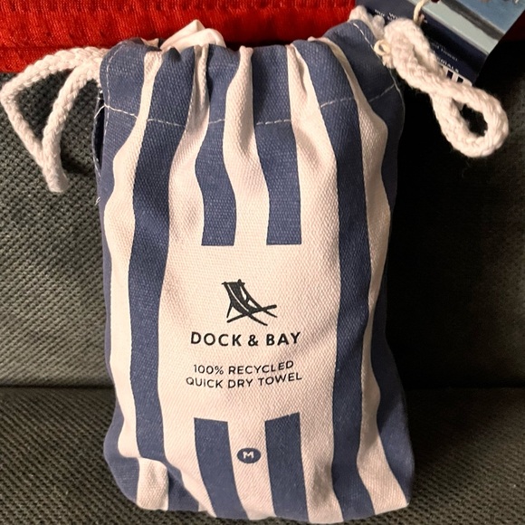 Other - Blue and White Striped Drawstring Bag with a large towel